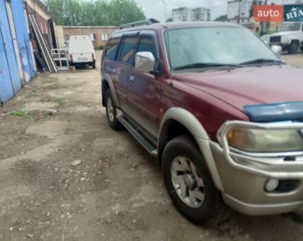 Червоний Міцубісі Паджеро Спорт, об'ємом двигуна 2.97 л та пробігом 300 тис. км за 6500 $, фото 1 на Automoto.ua