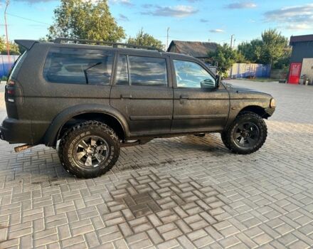 Червоний Міцубісі Паджеро Спорт, об'ємом двигуна 2.5 л та пробігом 327 тис. км за 6000 $, фото 1 на Automoto.ua