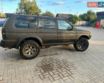 Червоний Міцубісі Паджеро Спорт, об'ємом двигуна 2.48 л та пробігом 327 тис. км за 6600 $, фото 1 на Automoto.ua