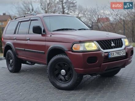 Красный Мицубиси Паджеро Спорт, объемом двигателя 3 л и пробегом 155 тыс. км за 5777 $, фото 1 на Automoto.ua