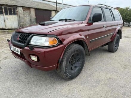Червоний Міцубісі Паджеро Спорт, об'ємом двигуна 2.5 л та пробігом 233 тис. км за 3700 $, фото 1 на Automoto.ua