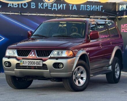 Червоний Міцубісі Паджеро Спорт, об'ємом двигуна 3 л та пробігом 212 тис. км за 6999 $, фото 1 на Automoto.ua