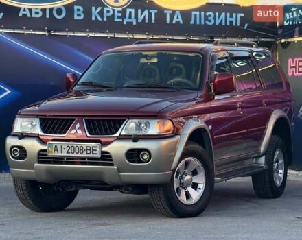 Червоний Міцубісі Паджеро Спорт, об'ємом двигуна 2.97 л та пробігом 212 тис. км за 6999 $, фото 1 на Automoto.ua
