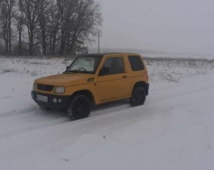 Желтый Мицубиси Паджеро Спорт, объемом двигателя 0.6 л и пробегом 150 тыс. км за 3200 $, фото 9 на Automoto.ua
