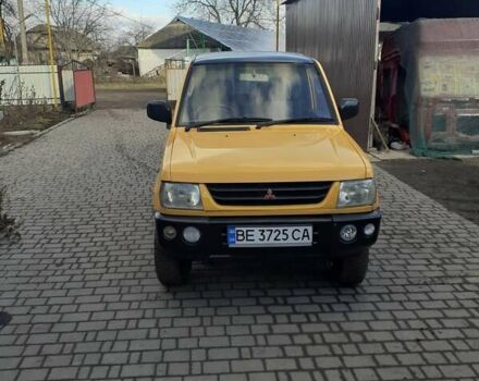 Желтый Мицубиси Паджеро Спорт, объемом двигателя 0.6 л и пробегом 150 тыс. км за 3200 $, фото 3 на Automoto.ua
