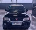 Сірий Міцубісі Паджеро Спорт, об'ємом двигуна 3 л та пробігом 350 тис. км за 2500 $, фото 4 на Automoto.ua