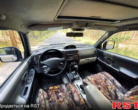 Серый Мицубиси Паджеро Спорт, объемом двигателя 3 л и пробегом 242 тыс. км за 6999 $, фото 2 на Automoto.ua