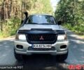 Серый Мицубиси Паджеро Спорт, объемом двигателя 3 л и пробегом 242 тыс. км за 6999 $, фото 1 на Automoto.ua
