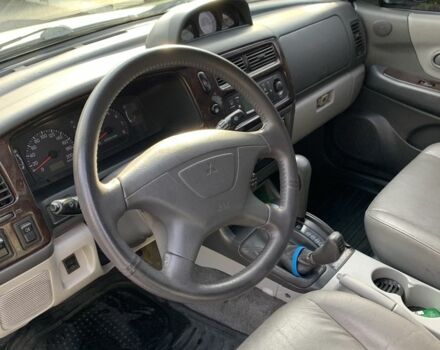 Сірий Міцубісі Паджеро Спорт, об'ємом двигуна 3 л та пробігом 268 тис. км за 7000 $, фото 4 на Automoto.ua