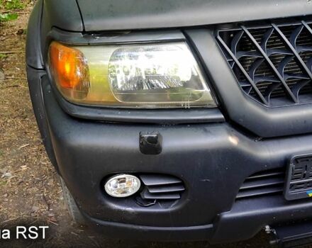 Сірий Міцубісі Паджеро Спорт, об'ємом двигуна 3 л та пробігом 240 тис. км за 8000 $, фото 2 на Automoto.ua