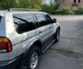 Сірий Міцубісі Паджеро Спорт, об'ємом двигуна 3 л та пробігом 268 тис. км за 7000 $, фото 1 на Automoto.ua