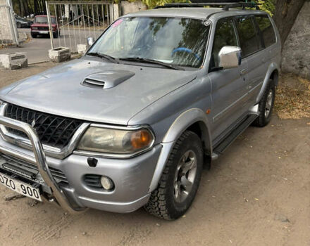 Серый Мицубиси Паджеро Спорт, объемом двигателя 2.5 л и пробегом 283 тыс. км за 6000 $, фото 1 на Automoto.ua
