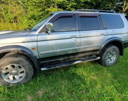 Серый Мицубиси Паджеро Спорт, объемом двигателя 2.5 л и пробегом 235 тыс. км за 8800 $, фото 4 на Automoto.ua