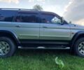 Серый Мицубиси Паджеро Спорт, объемом двигателя 2.5 л и пробегом 235 тыс. км за 8800 $, фото 6 на Automoto.ua