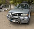 Серый Мицубиси Паджеро Спорт, объемом двигателя 2.5 л и пробегом 283 тыс. км за 7000 $, фото 1 на Automoto.ua