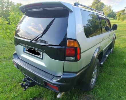 Серый Мицубиси Паджеро Спорт, объемом двигателя 2.5 л и пробегом 235 тыс. км за 8800 $, фото 2 на Automoto.ua