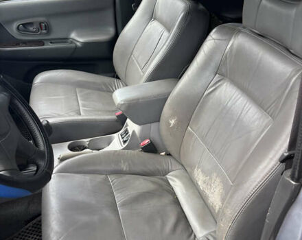 Серый Мицубиси Паджеро Спорт, объемом двигателя 2.5 л и пробегом 283 тыс. км за 5000 $, фото 5 на Automoto.ua