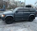 Серый Мицубиси Паджеро Спорт, объемом двигателя 3 л и пробегом 300 тыс. км за 5900 $, фото 2 на Automoto.ua
