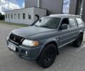 Сірий Міцубісі Паджеро Спорт, об'ємом двигуна 2.5 л та пробігом 200 тис. км за 3200 $, фото 1 на Automoto.ua