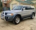 Сірий Міцубісі Паджеро Спорт, об'ємом двигуна 2.5 л та пробігом 305 тис. км за 6400 $, фото 1 на Automoto.ua