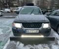Серый Мицубиси Паджеро Спорт, объемом двигателя 3 л и пробегом 300 тыс. км за 5900 $, фото 1 на Automoto.ua
