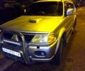 Сірий Міцубісі Паджеро Спорт, об'ємом двигуна 2.5 л та пробігом 280 тис. км за 10000 $, фото 1 на Automoto.ua