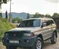Серый Мицубиси Паджеро Спорт, объемом двигателя 3 л и пробегом 250 тыс. км за 8900 $, фото 1 на Automoto.ua