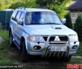 Серый Мицубиси Паджеро Спорт, объемом двигателя 2.5 л и пробегом 280 тыс. км за 10000 $, фото 1 на Automoto.ua