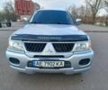 Сірий Міцубісі Паджеро Спорт, об'ємом двигуна 3 л та пробігом 250 тис. км за 7500 $, фото 1 на Automoto.ua