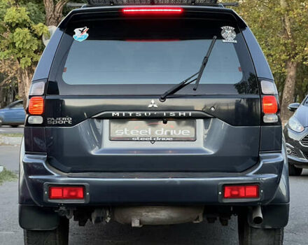 Серый Мицубиси Паджеро Спорт, объемом двигателя 2.97 л и пробегом 322 тыс. км за 8799 $, фото 4 на Automoto.ua