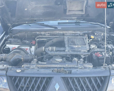 Сірий Міцубісі Паджеро Спорт, об'ємом двигуна 2.48 л та пробігом 225 тис. км за 8800 $, фото 6 на Automoto.ua