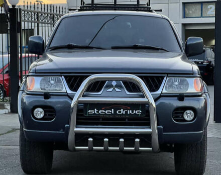 Серый Мицубиси Паджеро Спорт, объемом двигателя 2.97 л и пробегом 322 тыс. км за 8799 $, фото 2 на Automoto.ua