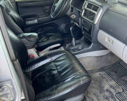 Сірий Міцубісі Паджеро Спорт, об'ємом двигуна 2.5 л та пробігом 300 тис. км за 9000 $, фото 10 на Automoto.ua