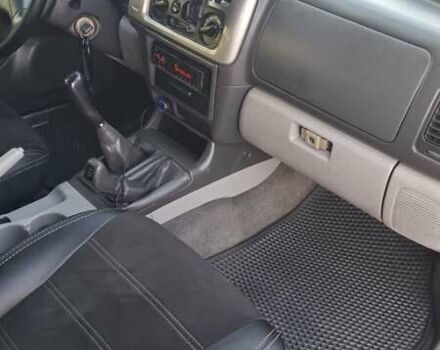 Сірий Міцубісі Паджеро Спорт, об'ємом двигуна 2.5 л та пробігом 223 тис. км за 9300 $, фото 10 на Automoto.ua