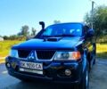 Сірий Міцубісі Паджеро Спорт, об'ємом двигуна 2.5 л та пробігом 186 тис. км за 10700 $, фото 1 на Automoto.ua