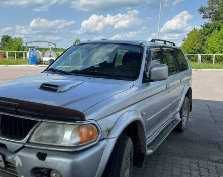 Сірий Міцубісі Паджеро Спорт, об'ємом двигуна 2.5 л та пробігом 300 тис. км за 9000 $, фото 3 на Automoto.ua