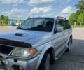 Сірий Міцубісі Паджеро Спорт, об'ємом двигуна 2.5 л та пробігом 300 тис. км за 9000 $, фото 3 на Automoto.ua