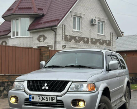 Серый Мицубиси Паджеро Спорт, объемом двигателя 3 л и пробегом 235 тыс. км за 8400 $, фото 2 на Automoto.ua