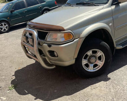 Серый Мицубиси Паджеро Спорт, объемом двигателя 3 л и пробегом 299 тыс. км за 8000 $, фото 2 на Automoto.ua