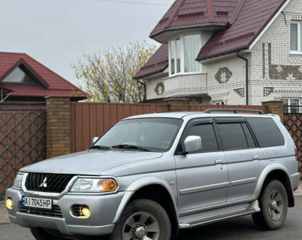 Серый Мицубиси Паджеро Спорт, объемом двигателя 3 л и пробегом 235 тыс. км за 8400 $, фото 1 на Automoto.ua