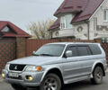 Серый Мицубиси Паджеро Спорт, объемом двигателя 3 л и пробегом 235 тыс. км за 8400 $, фото 1 на Automoto.ua