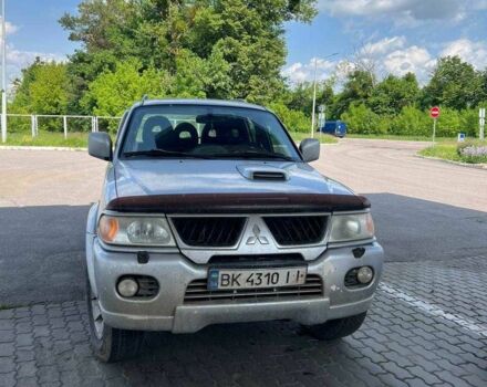 Сірий Міцубісі Паджеро Спорт, об'ємом двигуна 2.5 л та пробігом 300 тис. км за 9000 $, фото 5 на Automoto.ua