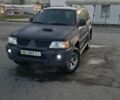 Сірий Міцубісі Паджеро Спорт, об'ємом двигуна 2.5 л та пробігом 223 тис. км за 9300 $, фото 1 на Automoto.ua