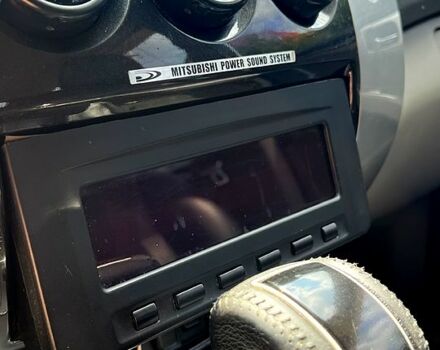 Серый Мицубиси Паджеро Спорт, объемом двигателя 2.5 л и пробегом 150 тыс. км за 16700 $, фото 2 на Automoto.ua