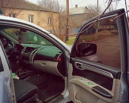 Серый Мицубиси Паджеро Спорт, объемом двигателя 2.5 л и пробегом 253 тыс. км за 12000 $, фото 3 на Automoto.ua