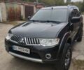 Серый Мицубиси Паджеро Спорт, объемом двигателя 2.48 л и пробегом 255 тыс. км за 14900 $, фото 1 на Automoto.ua