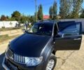 Сірий Міцубісі Паджеро Спорт, об'ємом двигуна 2.5 л та пробігом 223 тис. км за 14300 $, фото 5 на Automoto.ua
