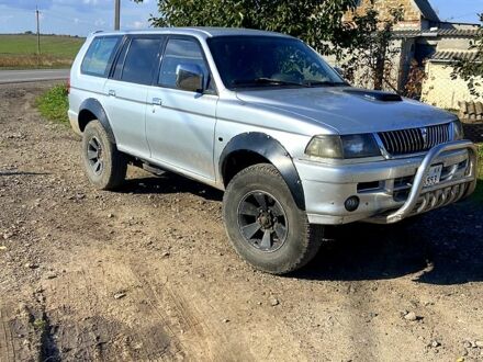 Серый Мицубиси Паджеро Спорт, объемом двигателя 2.5 л и пробегом 325 тыс. км за 5500 $, фото 1 на Automoto.ua