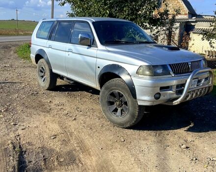 Серый Мицубиси Паджеро Спорт, объемом двигателя 2.5 л и пробегом 325 тыс. км за 5500 $, фото 1 на Automoto.ua