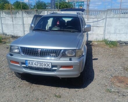 Сірий Міцубісі Паджеро Спорт, об'ємом двигуна 3 л та пробігом 322 тис. км за 7300 $, фото 1 на Automoto.ua